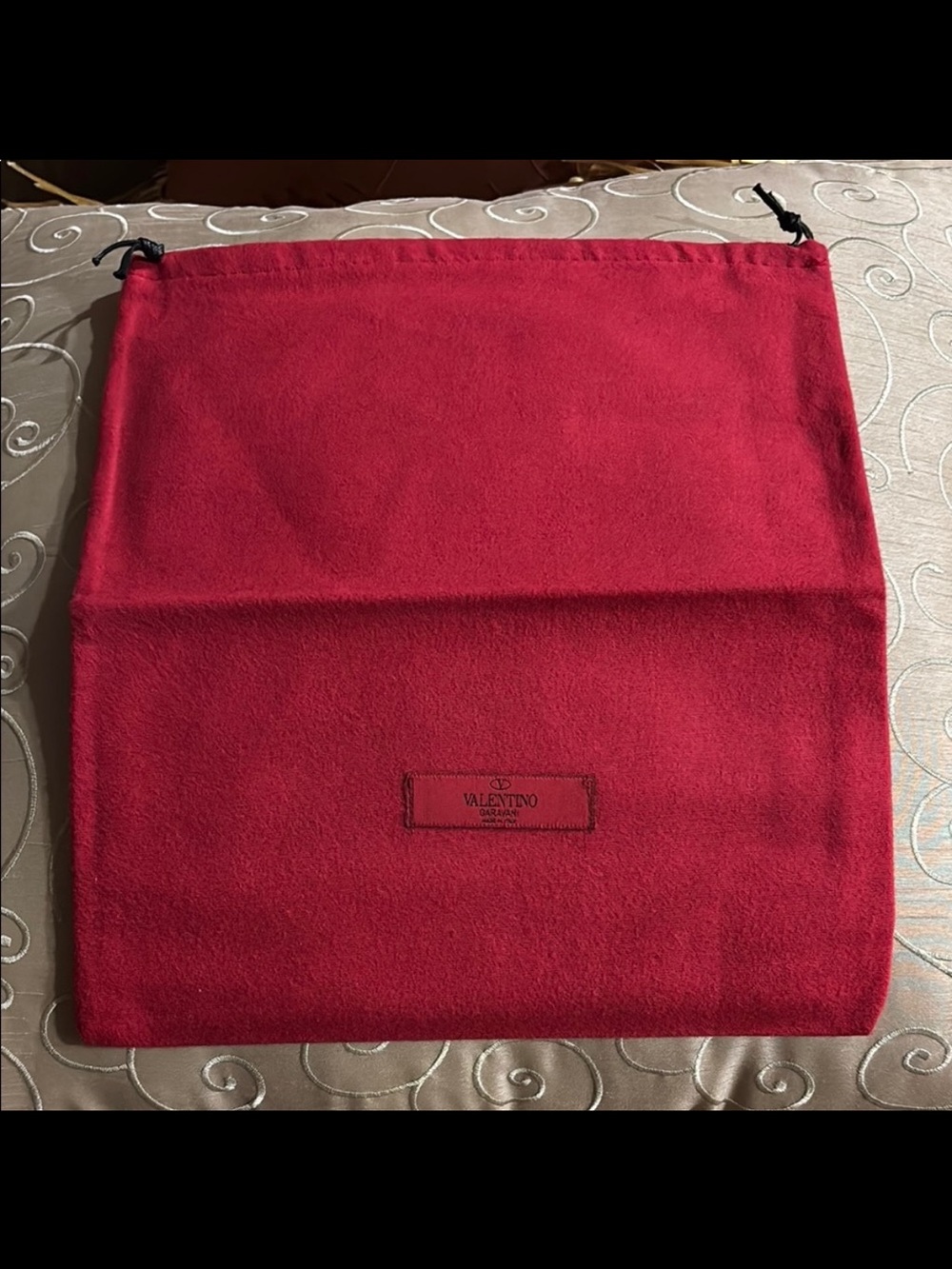Valentino Garavani felt drawstring dust bag